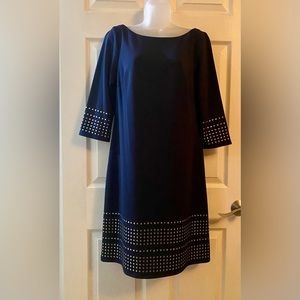 Navy blue dress with gold stud accents